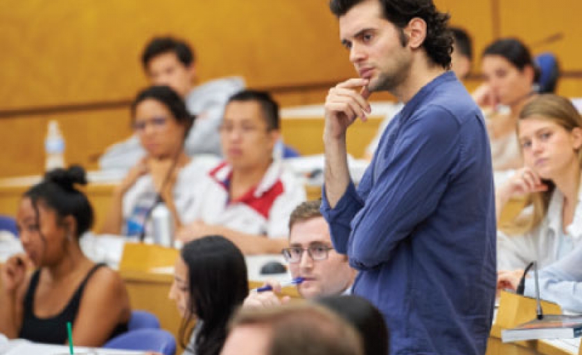 TA in classroom with students